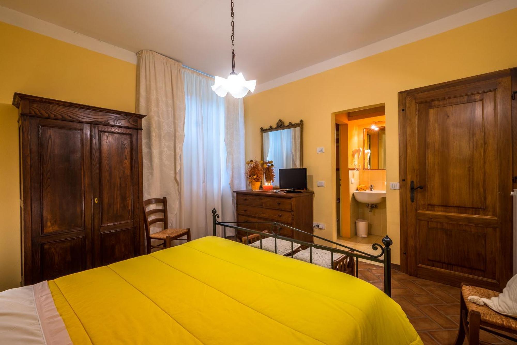 Giannetti Bed & Breakfast Poggio alle Mura Værelse billede